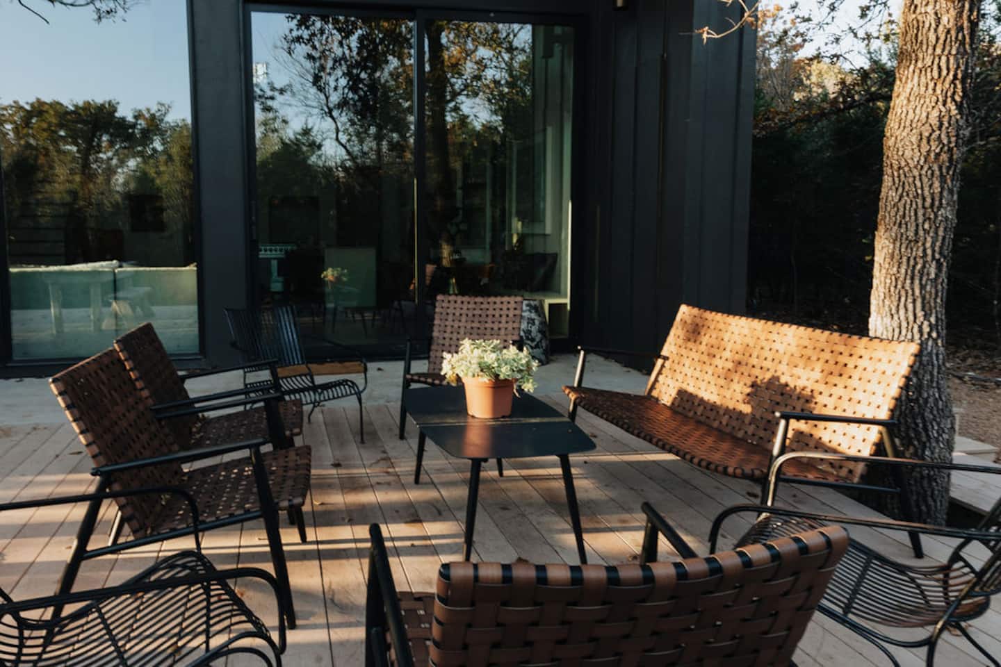 Deck lounge seating beside the glass gable